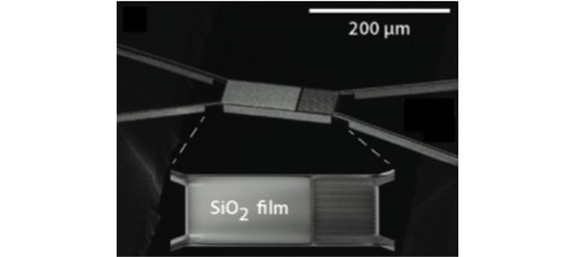Enhancement of Near-field Radiative Heat Transfer Using Polar dielectric Thin Films